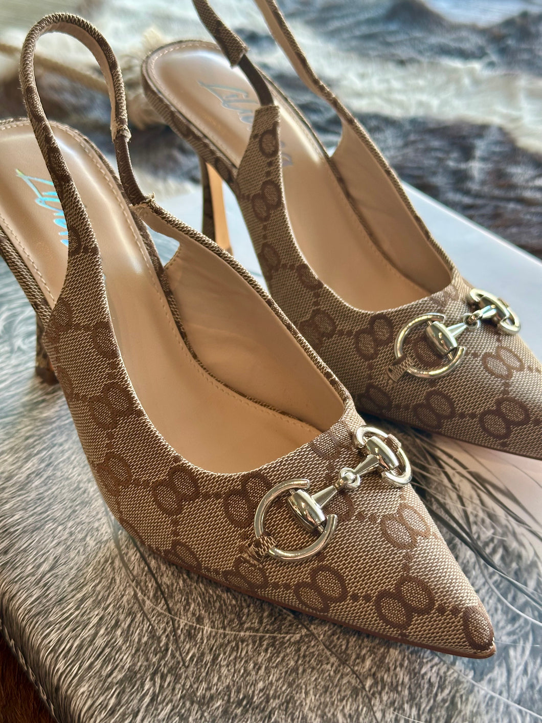 The Horsebit Slingback Heel