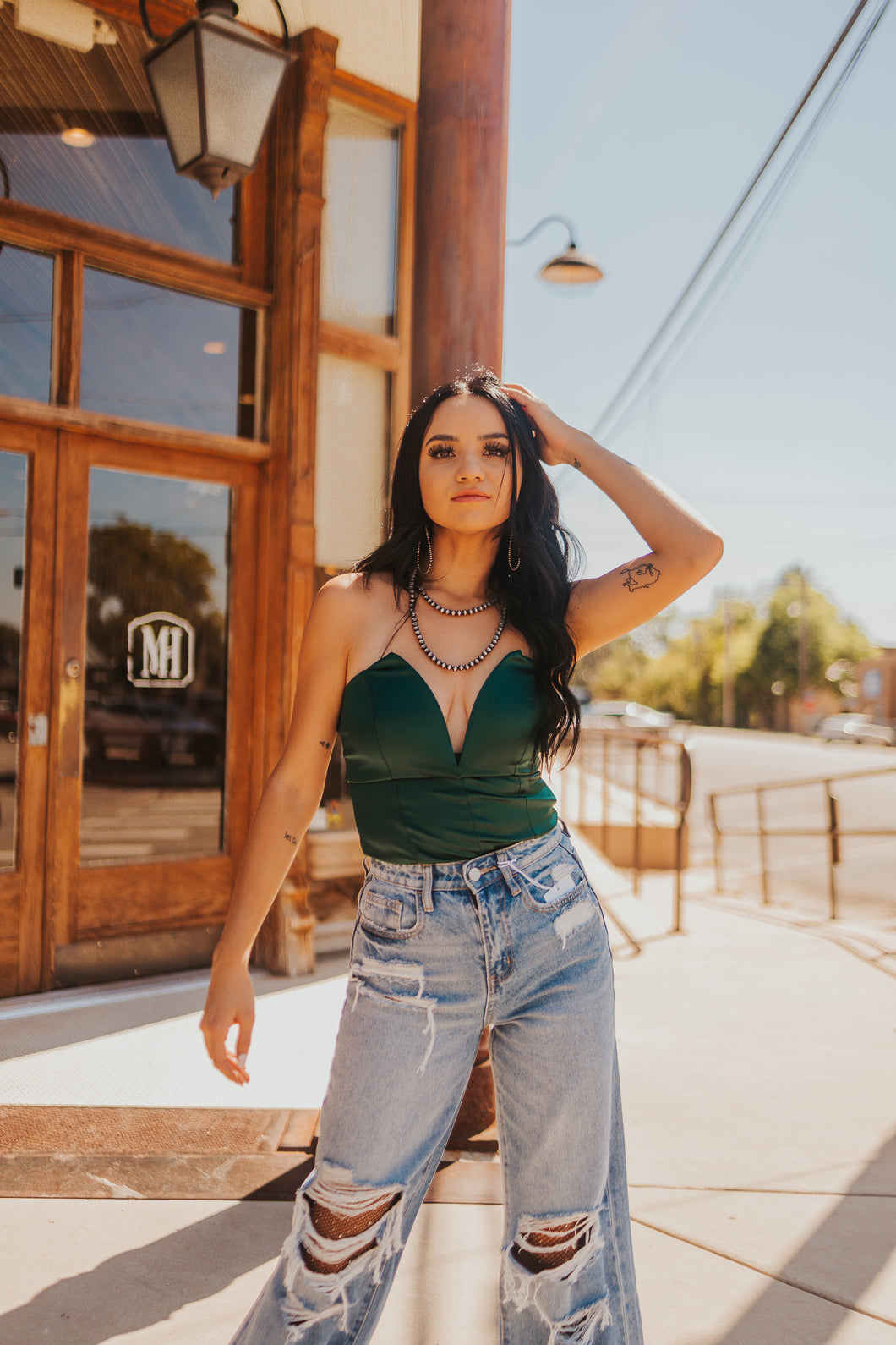 The Arden Bodysuit in Hunter Green